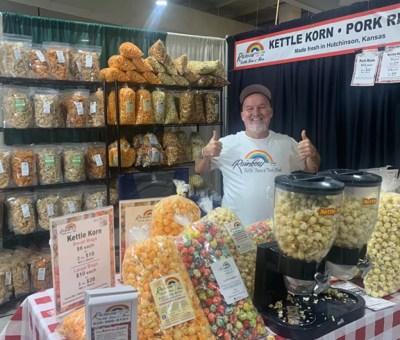 Mark Carney at booth for popcorn sales in kansas 