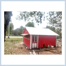 Photo of our minibarn to house our chickens and ducks, separated from rabbit pen.