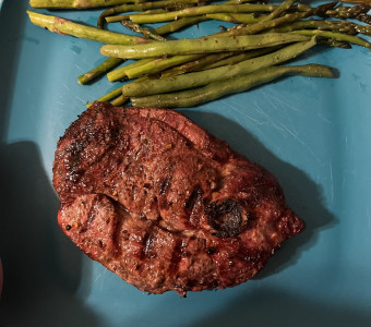 Grilled lamb steak served with asparagus 