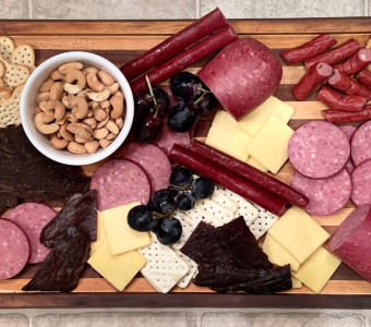  charcuterie board featuring our amazing specialty products