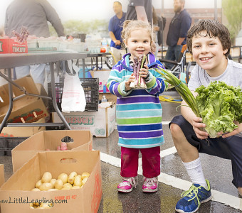 Kids holding Homegrown Produce