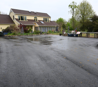 Parking area and display where the farm eggs and local honey are set up on Saturdays.